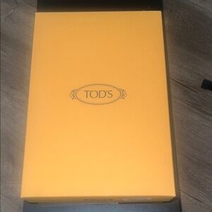 Tod's Vibrant Yellow Packaging